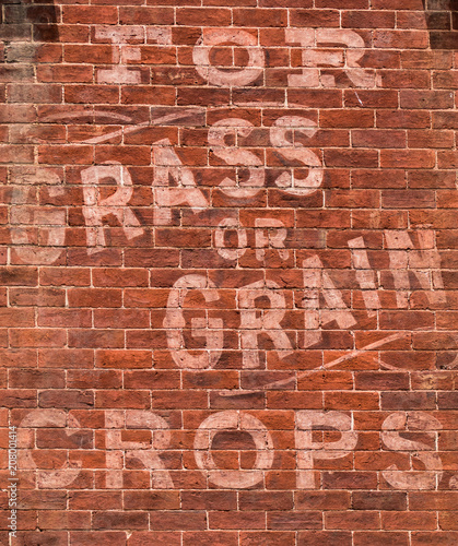 Red Brick wall advertising seasonal garden supplies