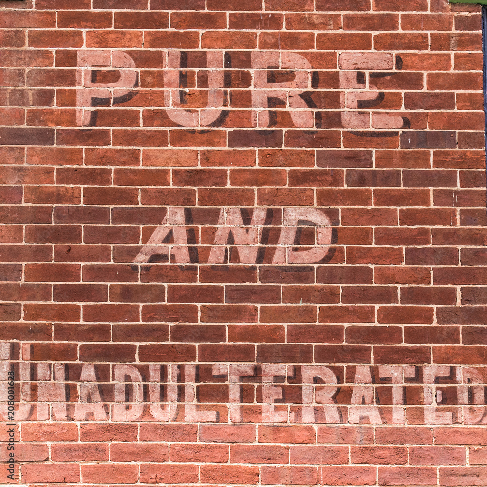 Red Brick wall advertising seasonal garden supplies Red Brick wall advertising seasonal garden supplies