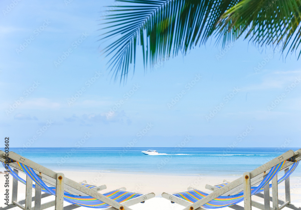 Comfortable beach chair at sea shore. Vacation concept.Sand beach and Beautiful sea background in summer.