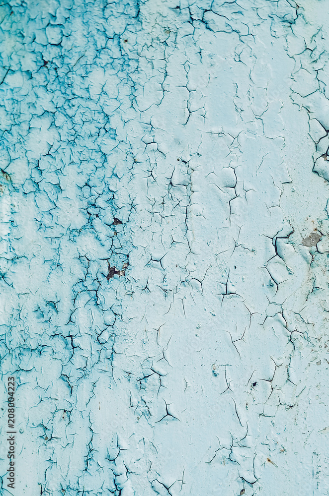texture and paint background. white blue color. cracks on the texture. vertical texture and paint background. white blue color. cracks on the texture. vertical