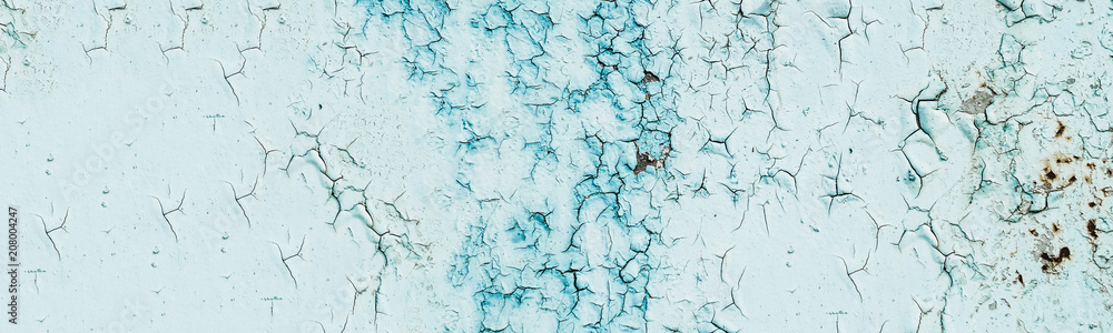 panorama. paint with cracks. texture and paint background. blue hue panorama. paint with cracks. texture and paint background. blue hue