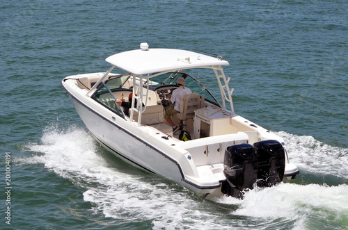 Fishing Boat cruising on the florida intra-coastal waterway off Miami Beach. photo