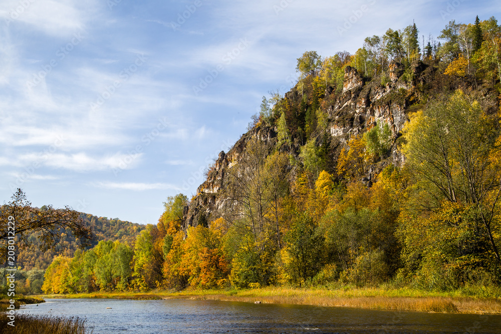 Fototapeta premium the river running along the rocky mountains