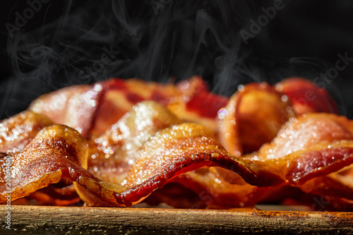 Closeup Pile of Hot Sizzling Bacon photo