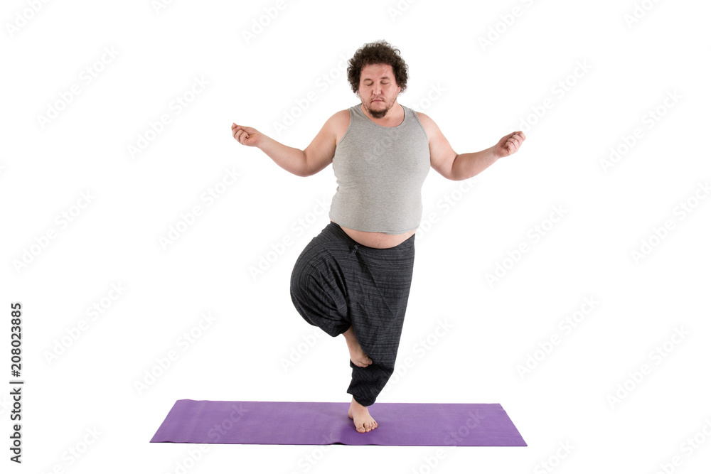 Funny fat man and yoga. White background.  