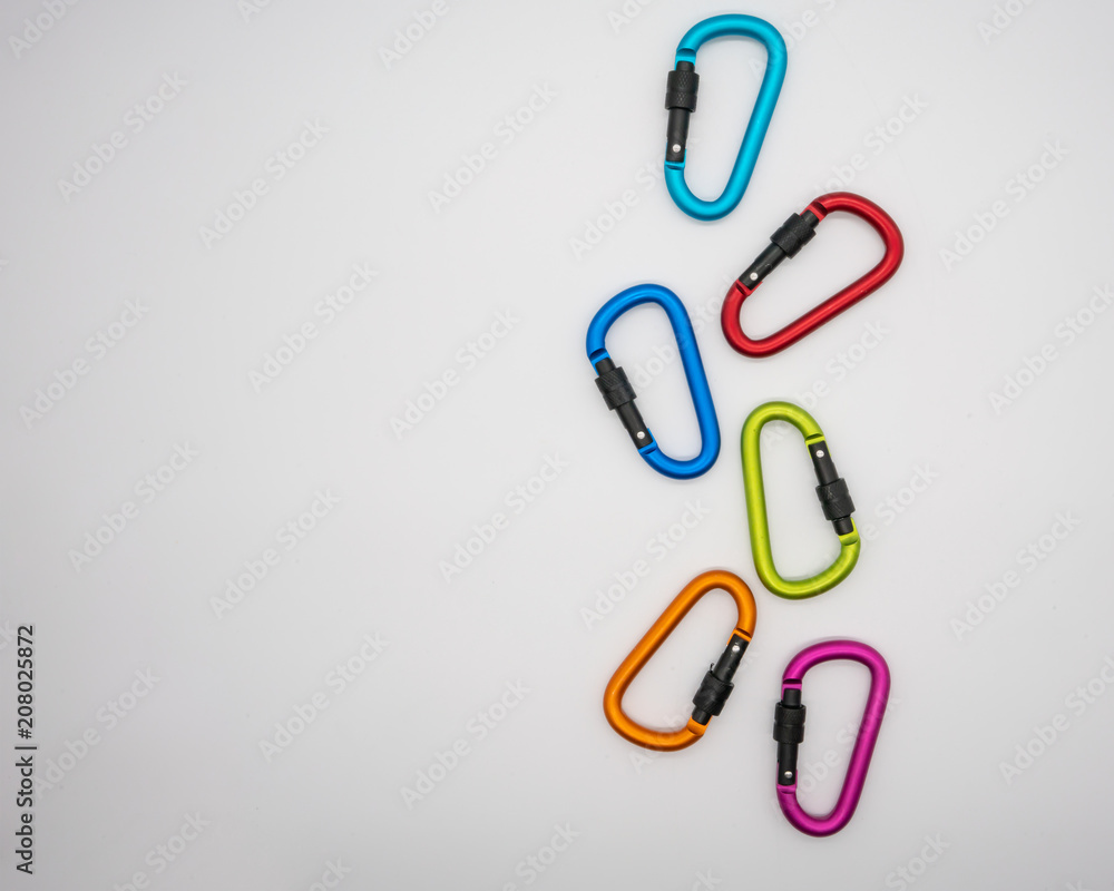 Colorful matte metal aluminum snap hook isolated on white background. Colorful matte metal aluminum snap hook isolated on white background.