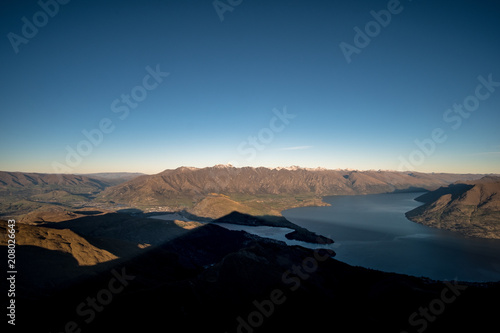 Beautiful landscape of Alps mountain and Queentown city before sunset.