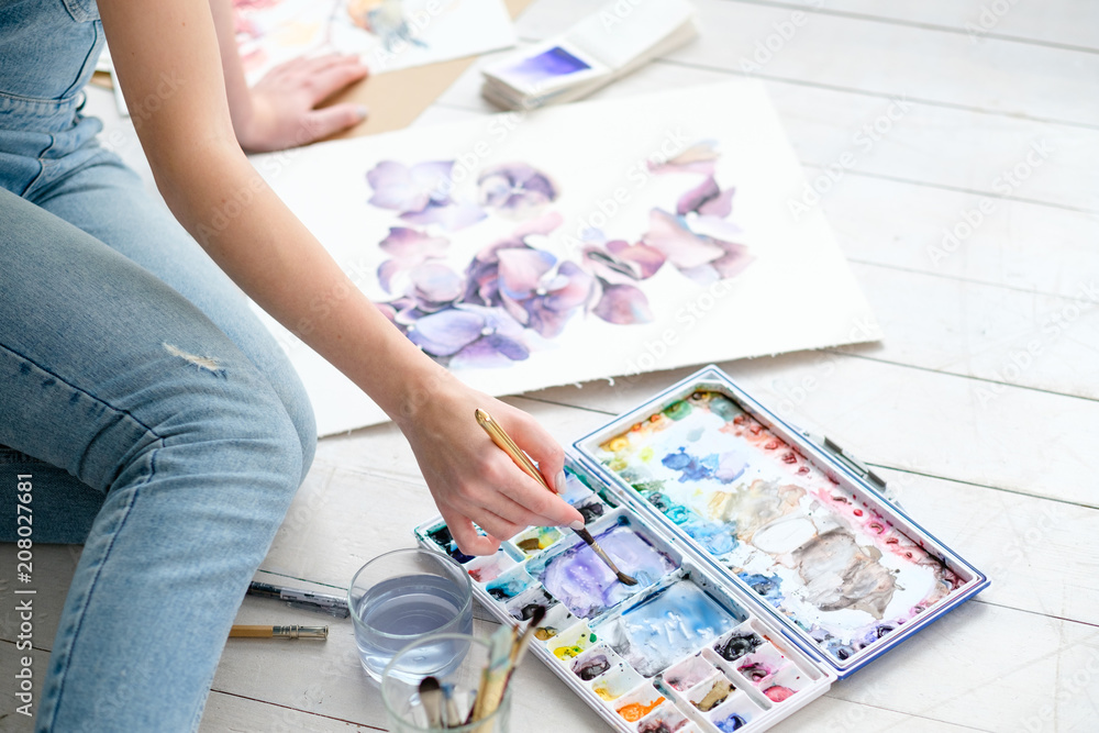 Fototapeta premium creative leisure. painting hobby. artful personality. talented girl drawing a picture