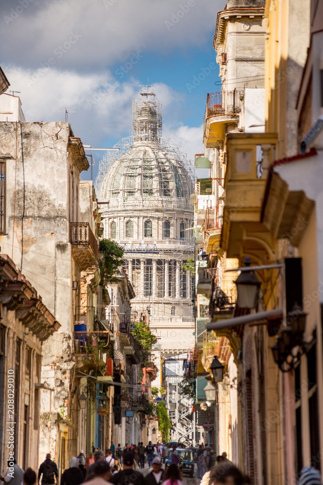 Havana, Cuba, The Capitol seen from a narrow street