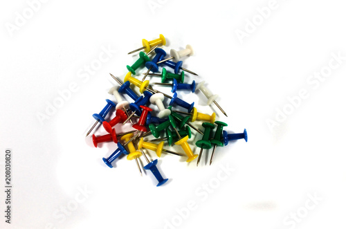 colored pins isolated on white background