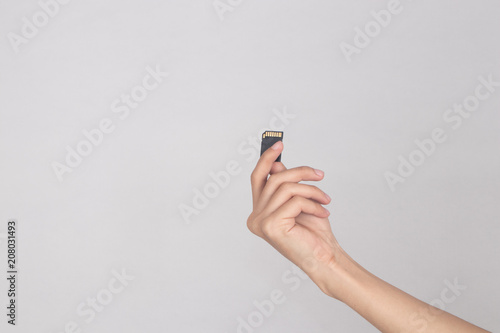 Holding the memory card isolated backgroung