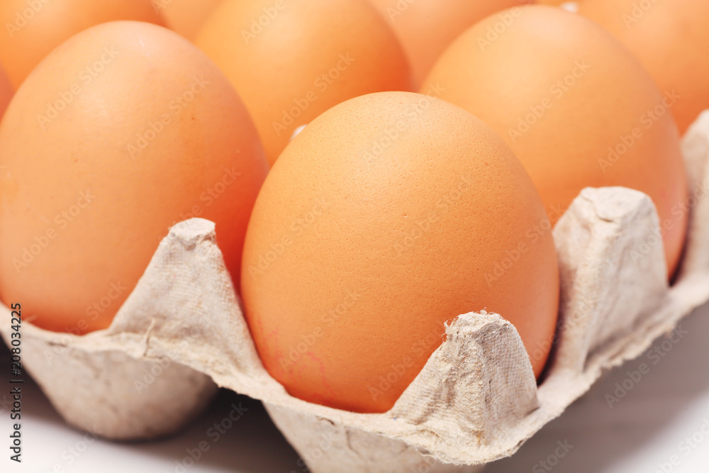 Eggs in a paper package on white background Eggs in a paper package on white background