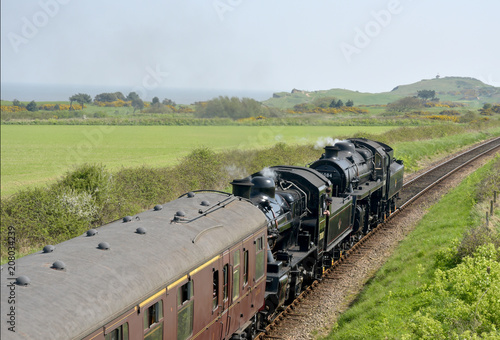 Obraz na płótnie Steam engine through countryside on North Norfolk Railway w salonie