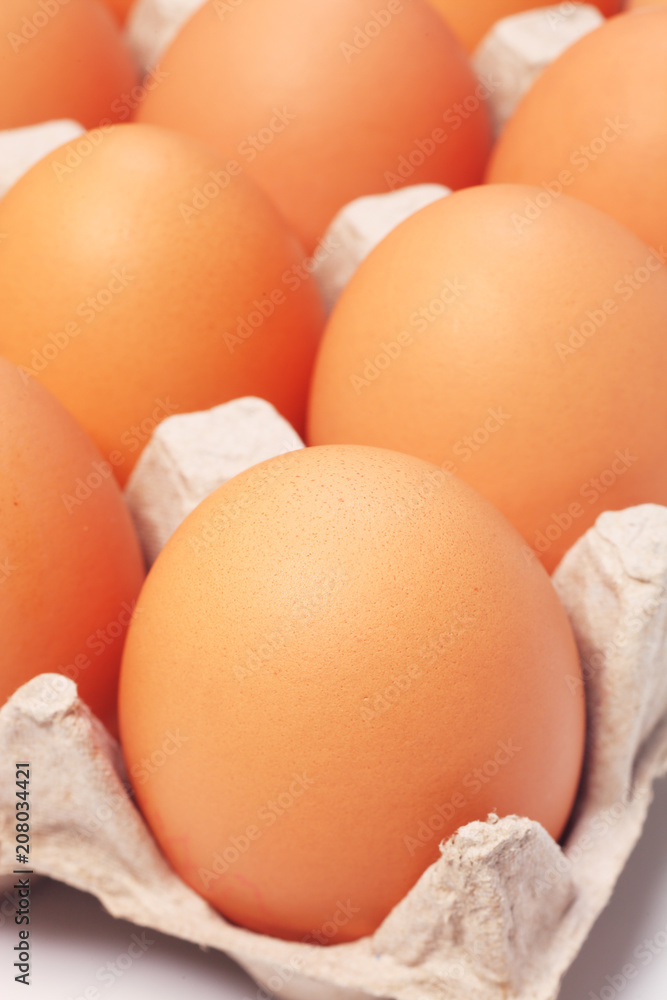 Eggs in a paper package on white background Eggs in a paper package on white background