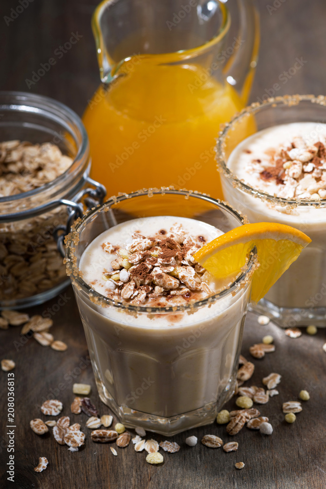 milkshake with oatmeal and orange, vertical milkshake with oatmeal and orange, vertical