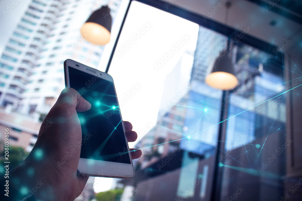 man pick smartphone in hand with mobile online network concept man pick smartphone in hand with mobile online network concept