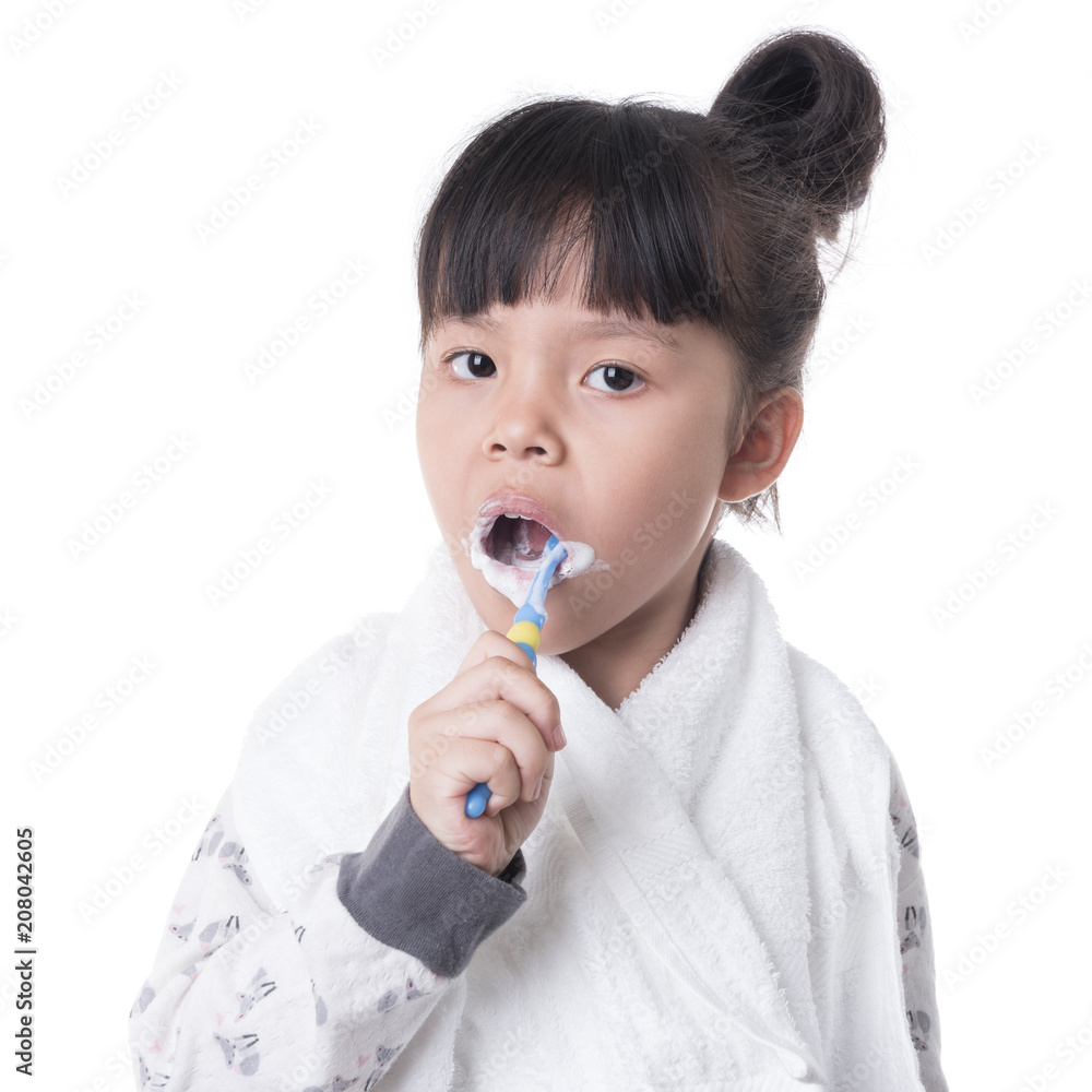 Little girl brushing her teeth isolated on white background Little girl brushing her teeth isolated on white background
