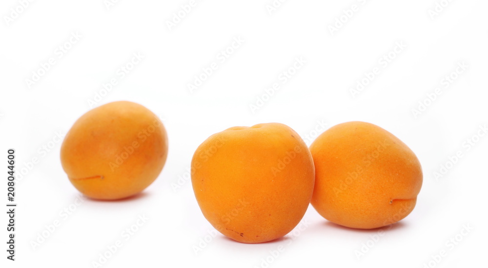 Fresh apricot fruits isolated on white background Fresh apricot fruits isolated on white background