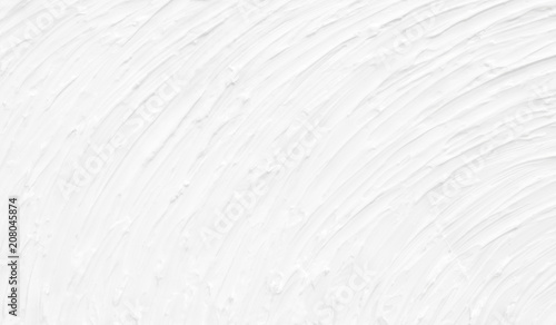 Texture of a paint of white color with patterns. Background with divorces for various purposes.