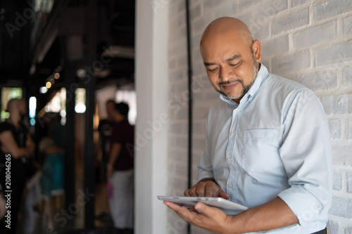 a man is using his smartphone