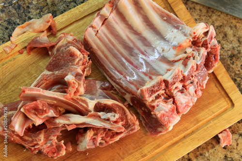 cutting board with fresh lamb ribs