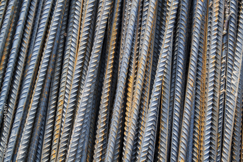 top view of the reinforcing steel bar stack close-up, rebar for concrete construction works piled on top of each other top view of the reinforcing steel bar stack close-up, rebar for concrete construction works piled on top of each other