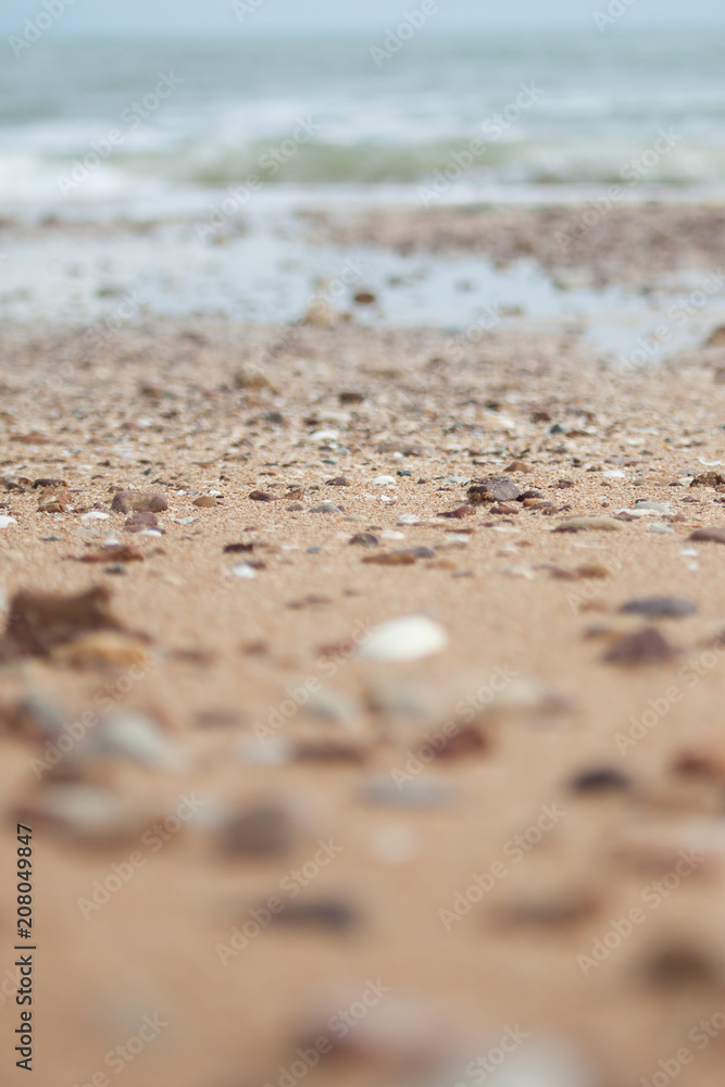 The focus of the beach with small rocks in Rayong in Thailand The focus of the beach with small rocks in Rayong in Thailand
