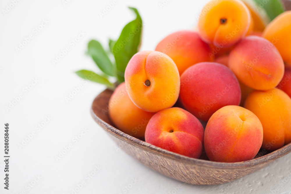 fresh apricots on white background fresh apricots on white background