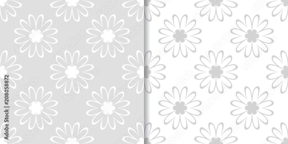 Light gray floral ornaments. Set of seamless patterns