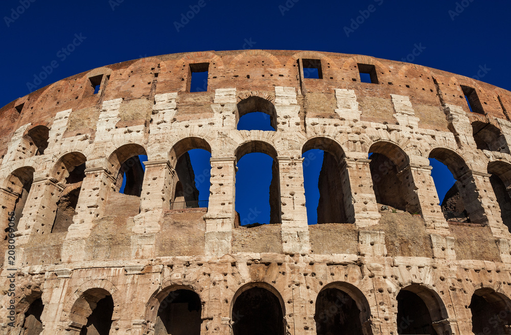 Coliseum monumental arcades with blue sky
