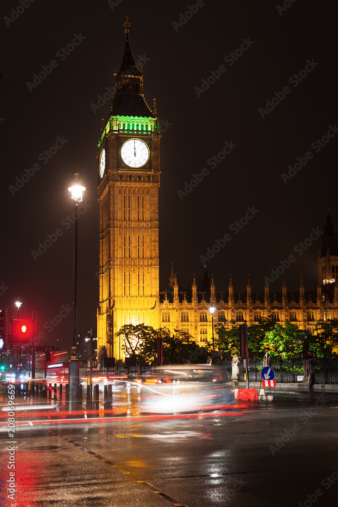 Popular tourist Big Ben and Houses of Parlament in night lights illumination in London, England, United Kingdom