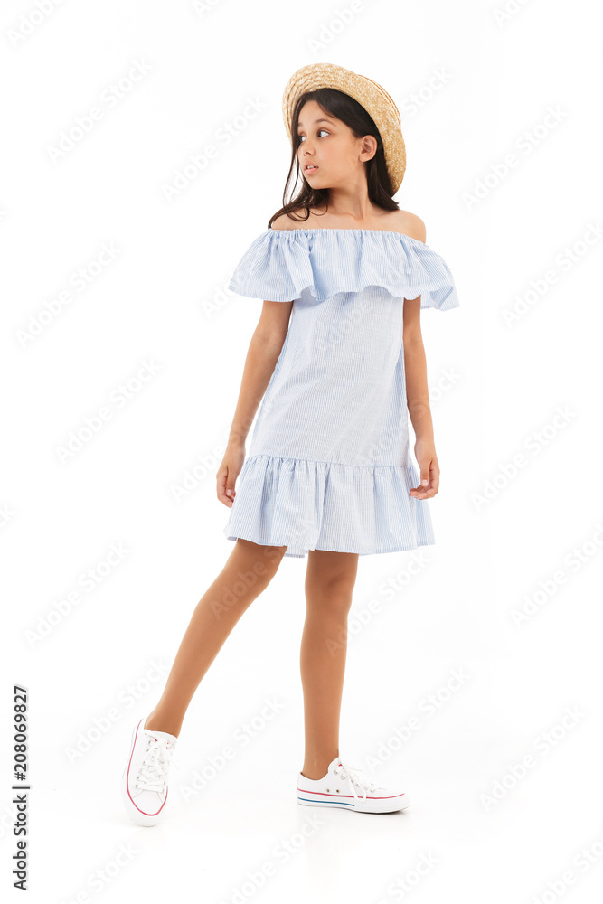 Full length image of Pretty young brunette girl in dress Full length image of Pretty young brunette girl in dress