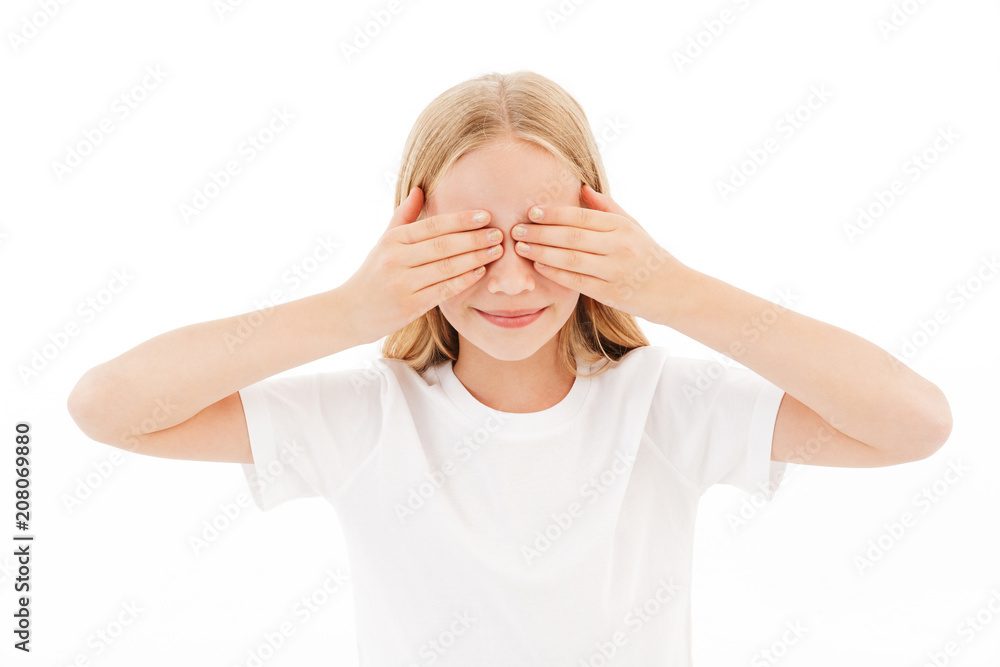 Cute girl standing isolated covering face with hands. Cute girl standing isolated covering face with hands.