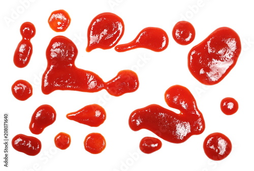 Red ketchup spread, puddle isolated on white background, tomato pure texture, top view