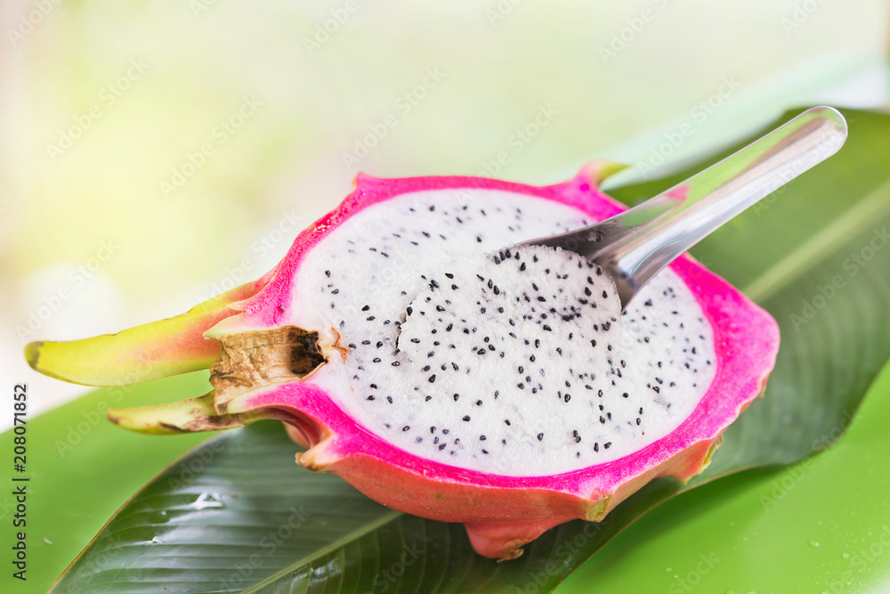 Fresh, tasty tropic, exotic dragon pitahya dragon fruit near palms Fresh, tasty tropic, exotic dragon pitahya dragon fruit near palms