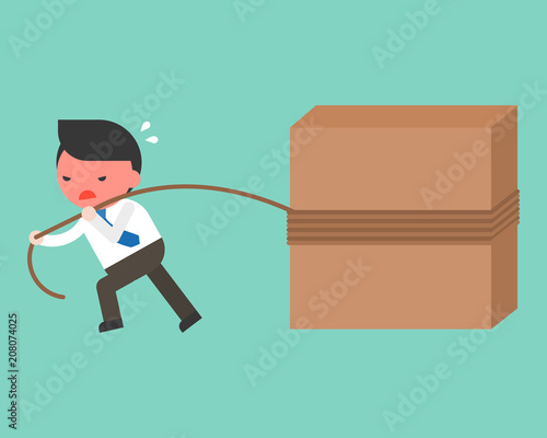 Businessman work hard, pulling block with rope