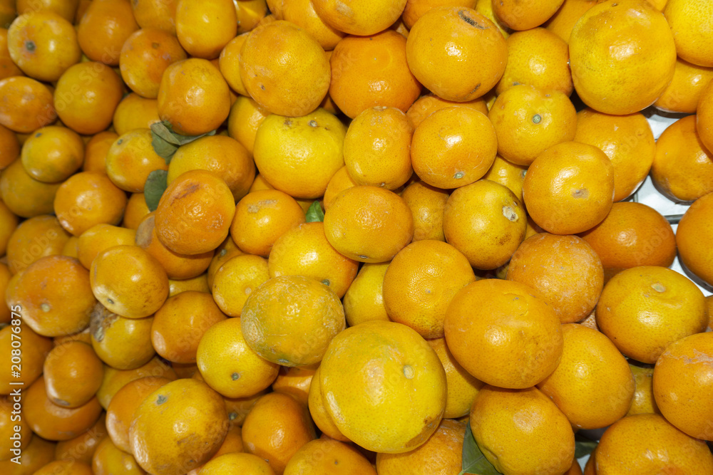 A lot of oranges for sales in the market