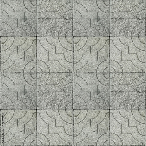 Seamless photo texture of pavement tile from natural stone with arabic ornament photo
