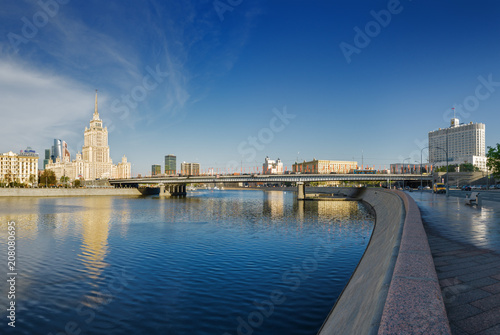 Sunny morning view of Smolenskaya embankment and Moskva river, Moscow, Russia. © Neonyn