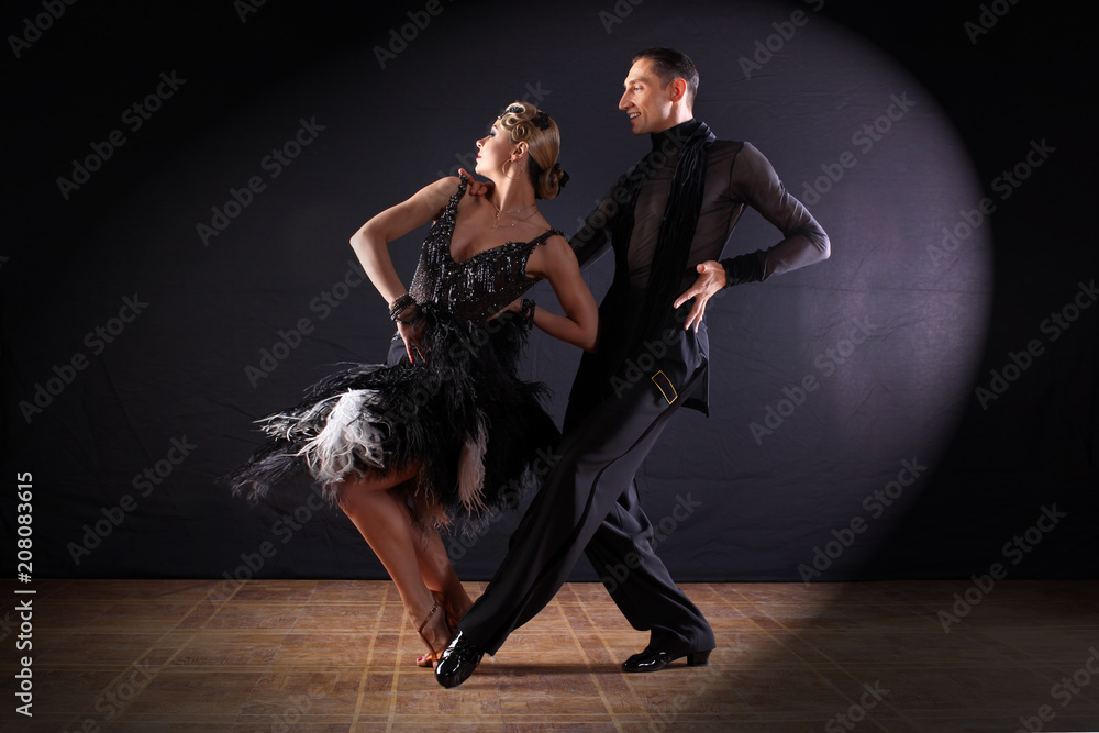 dancers in ballroom isolated on black background dancers in ballroom isolated on black background