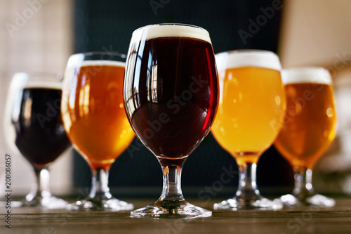 Beer Glasses On Wooden Table Closeup