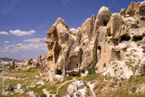 Ancient cavetown near Goreme, Cappadocia, Turkey. View to cliff dwellings.