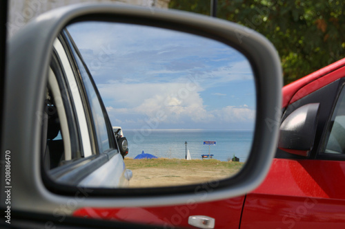 reflection of the beach and the sea in the mirror of the car, Zakynthos, Greece