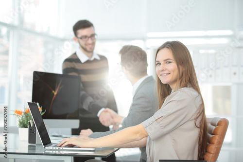 young business woman on blurred office background