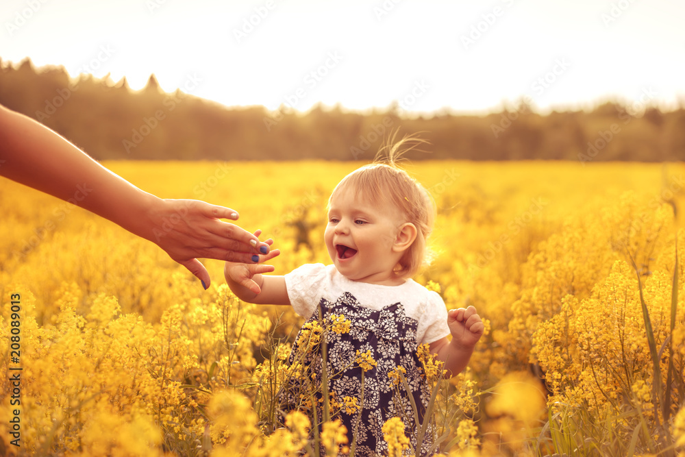 Funny girl in the field at sunset. Funny girl in the field at sunset.