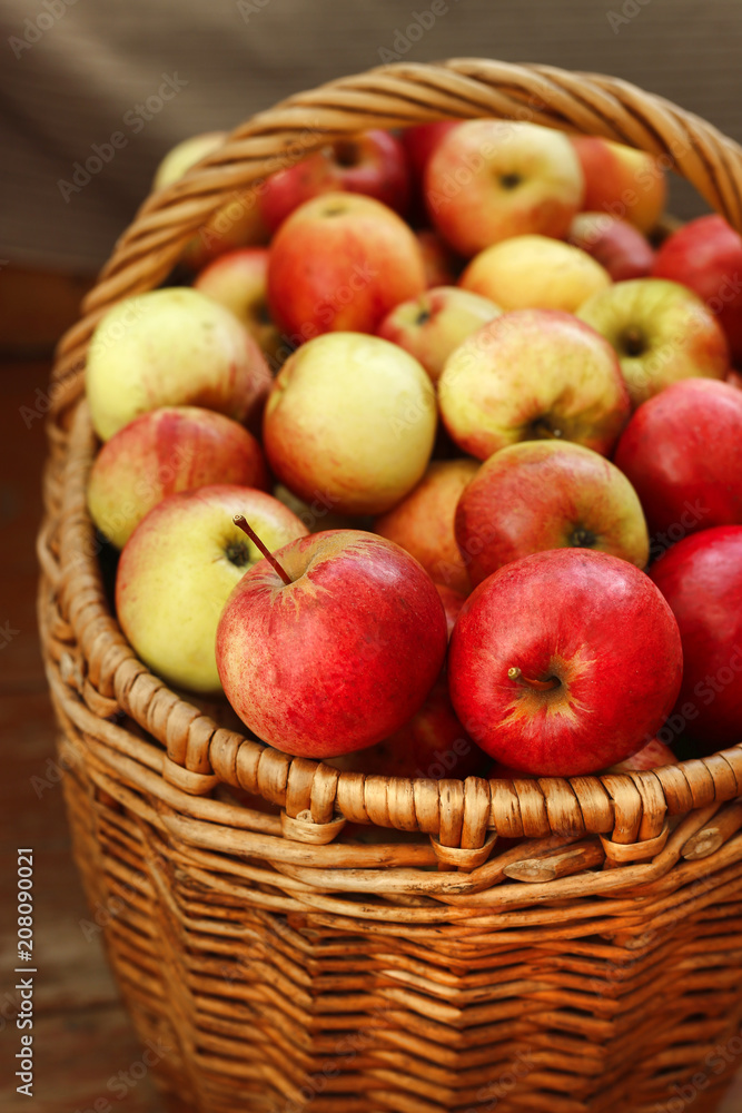 Bright tasty ripe apples in a basket Bright tasty ripe apples in a basket