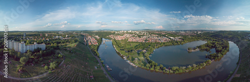 Panoramic aerial landscape shot of the river neckar with urban cityscape and lake with vineyards photo