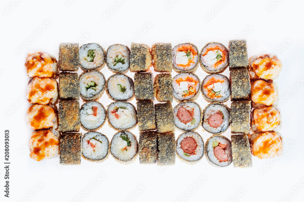 Sushi rolls on a white background. Isolated. Sushi rolls on a white background. Isolated.