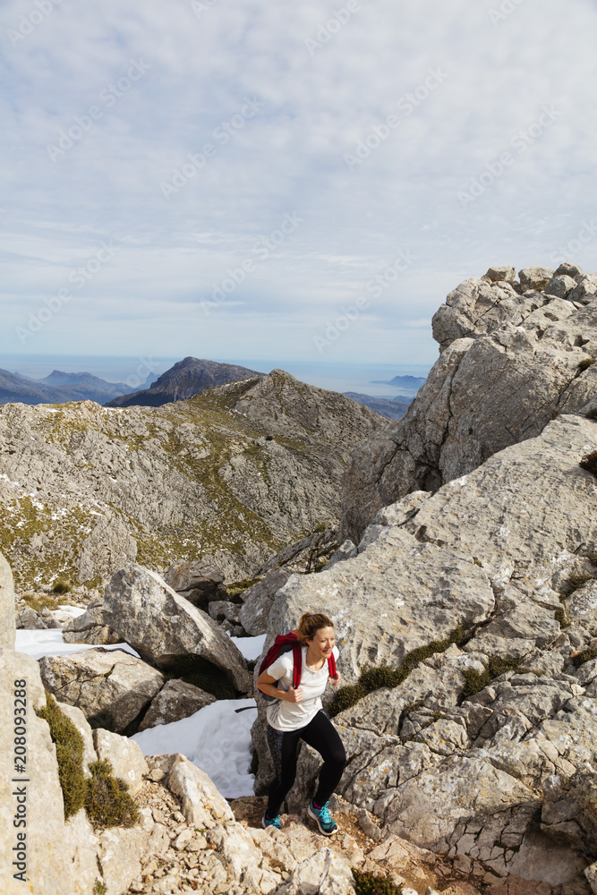 Serra de Tramuntura, hiker on Puig de Massanella Mallorca's highest accessible peak, Majorca, Balearic Islands, Spain, Mediterranean Serra de Tramuntura, hiker on Puig de Massanella Mallorca's highest accessible peak, Majorca, Balearic Islands, Spain, Mediterranean