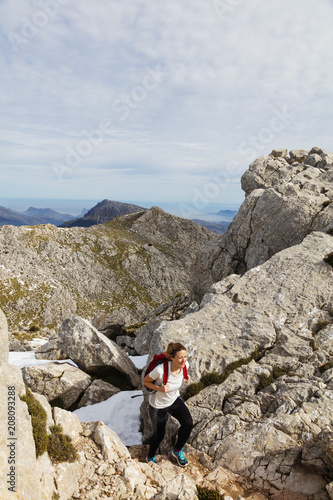 Serra de Tramuntura, hiker on Puig de Massanella Mallorca's highest accessible peak, Majorca, Balearic Islands, Spain, Mediterranean photo